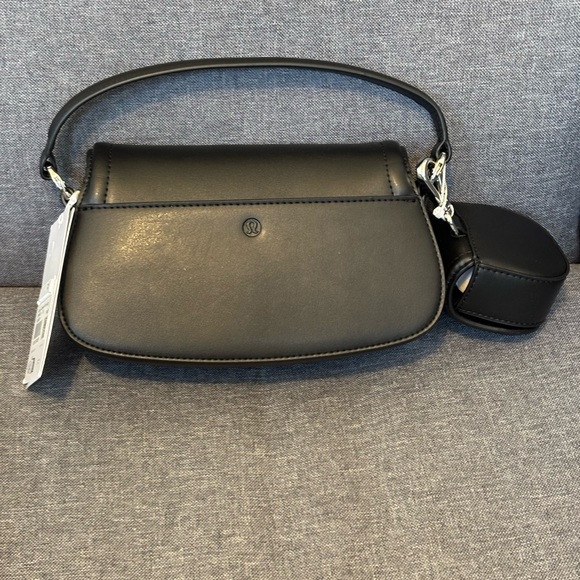 crossbody bags like lululemon YOSHUYUKI Waist Belt Bag for Women Lulu Dupes Mini Small Purse Sling Bag Cute Fashion Waterproof Fanny Pack Over The Shoulder Fashionable Travel Running Belt Pouch Bum Bag this bag blends practical storage with a clean NWOT Lululemon Patch Logo Crossbody